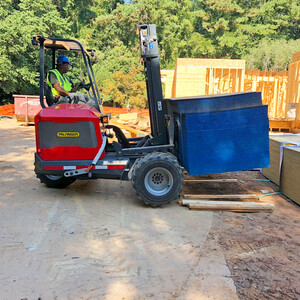 Truck-Mounted Forklift Delivery of Roofing Materials