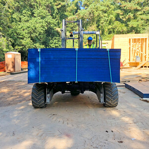 Truck-Mounted Forklift Delivery of Roofing Materials